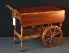 205    Wagon wheel mahogany dropside wagon with cutlery drawer        $230