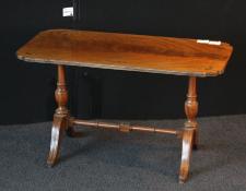 240    Double pedestal occasional table. Featuring brass inlay in top and facings of legs      $230